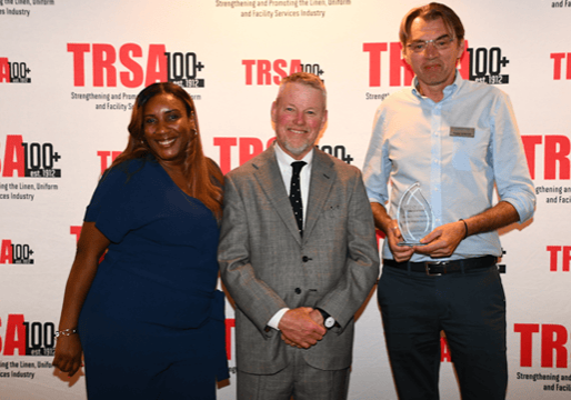 NOVO executives Wanda Javier (left) and Dragan Grabovac (right) pose with TRSA Chair Jim Kearns (center) after winning TRSA's Plant of the Year award.